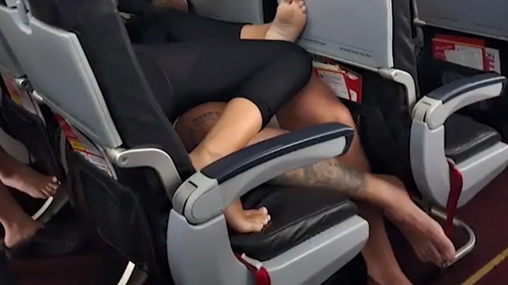 Barefoot plane passengers lying on top of each other horrify onlookers | Lifestyle [Video]