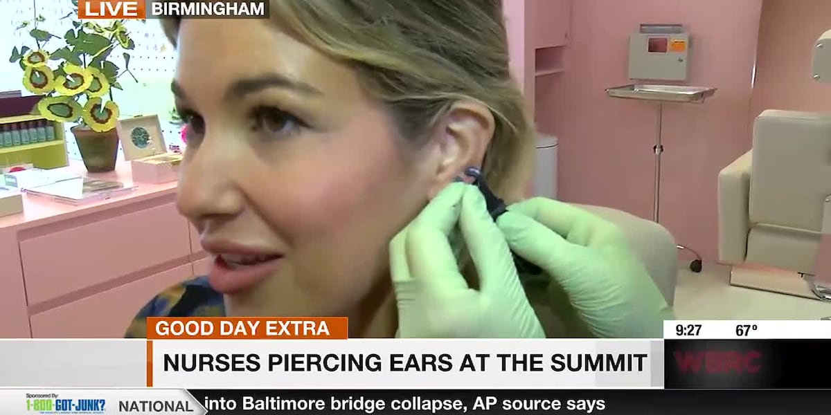 Nurses piercing ears at the Summit [Video]