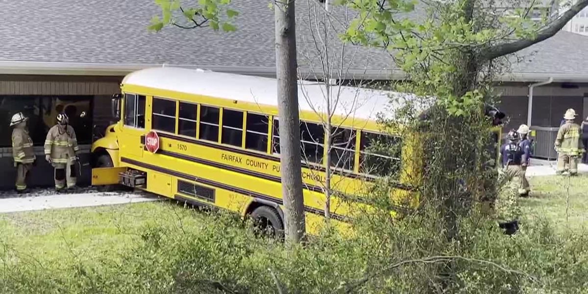 School bus hits DMV building, injures driver and 2 students, officials say [Video]