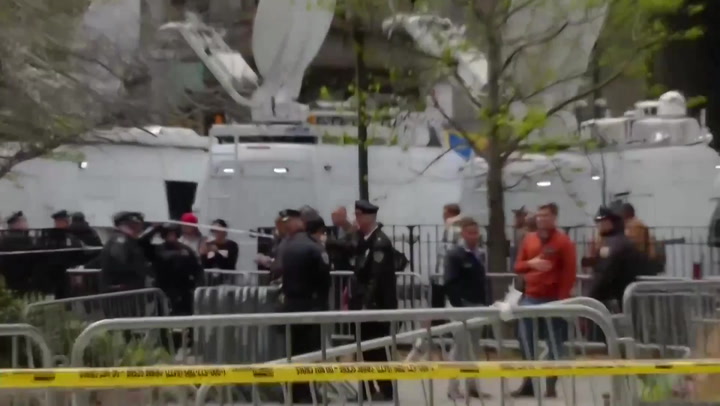 Police cordon park after man sets himself on fire outside Trump court | News [Video]