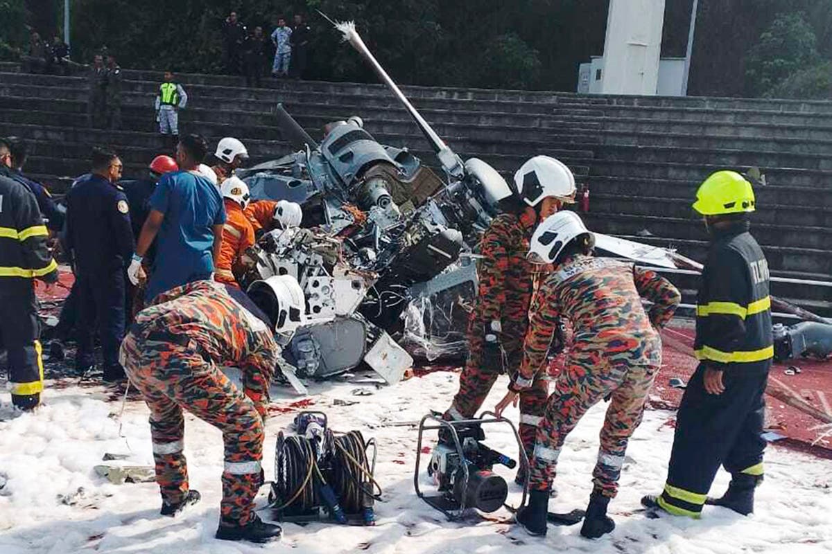 Malaysia helicopter crash: All 10 crew members killed after two naval aircraft collide mid-air during training [Video]