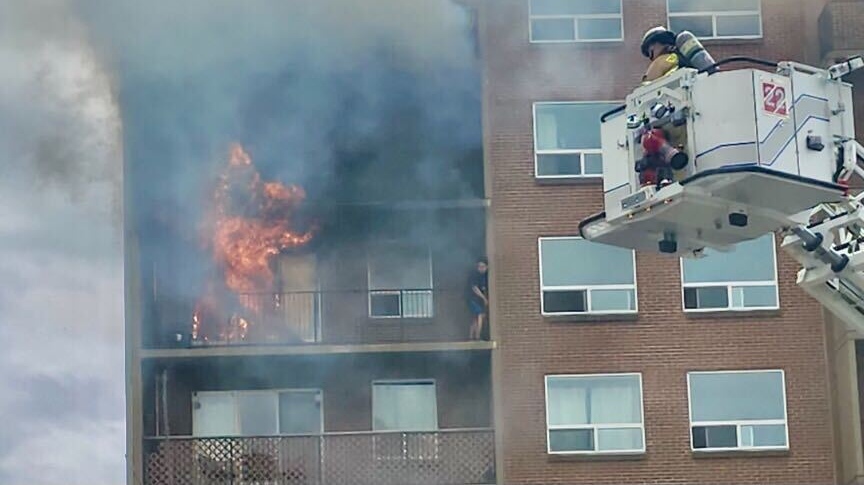 Person rescued from burning balcony on Jasper Avenue [Video]