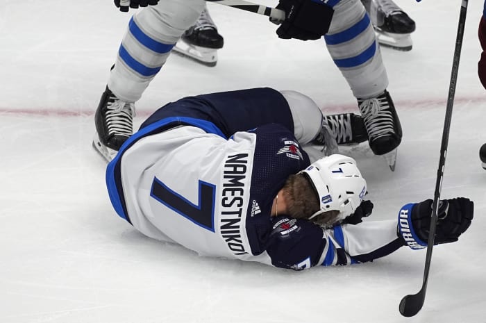 Jets forward Namestnikov is taken to the hospital after a puck hit him in the face [Video]