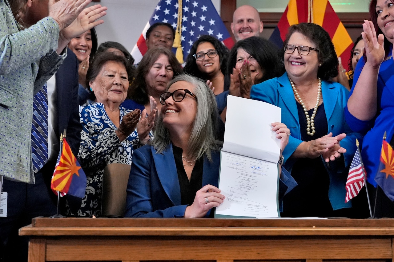 Arizona governor signs a bill to repeal 1864 ban on most abortions [Video]
