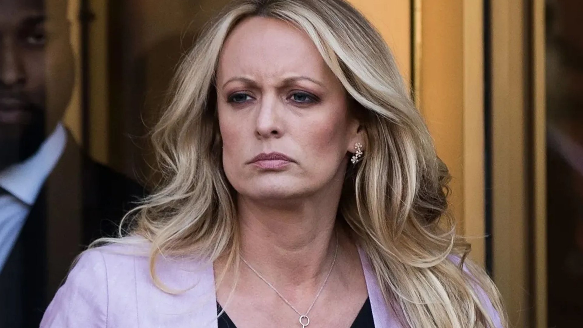 Stormy Daniels gives jury blow by blow account of ‘romp with Trump’ – from spanking, no condom & comments about Melania [Video]