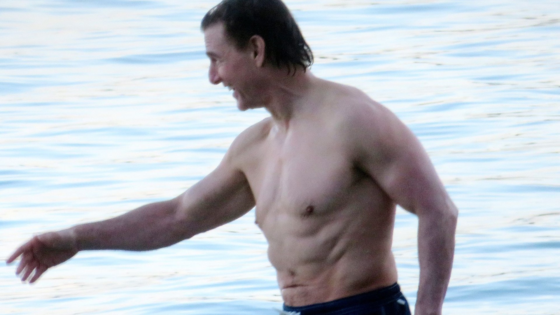 Tom Cruise, 61, looks amazing as he shows off ripped body on the beach 38 years after THAT iconic Top Gun scene [Video]
