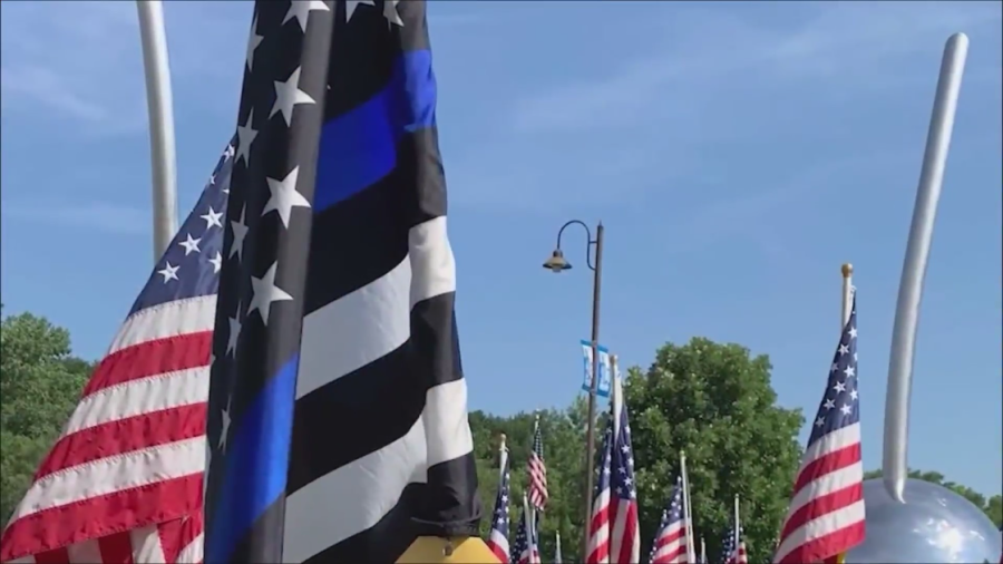 Merriam council votes to remove thin blue line flags from city event [Video]