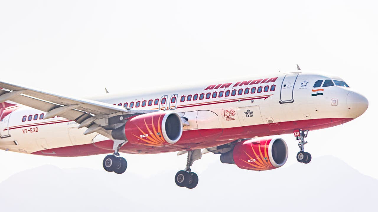 Air India Express plane engine catches fire, forcing emergency landing at Bangalore airport [Video]