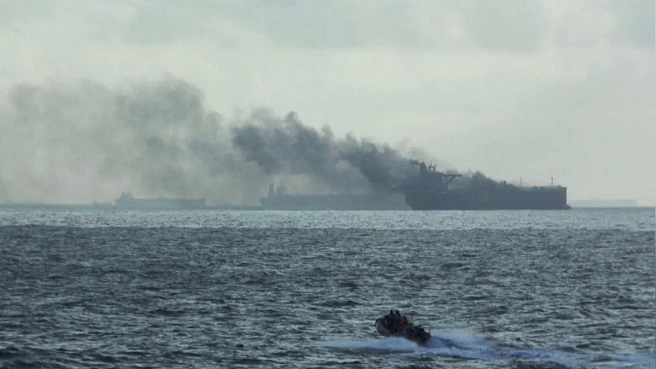 2 oil tankers catch fire off Singapore, navy rescues crews [Video]
