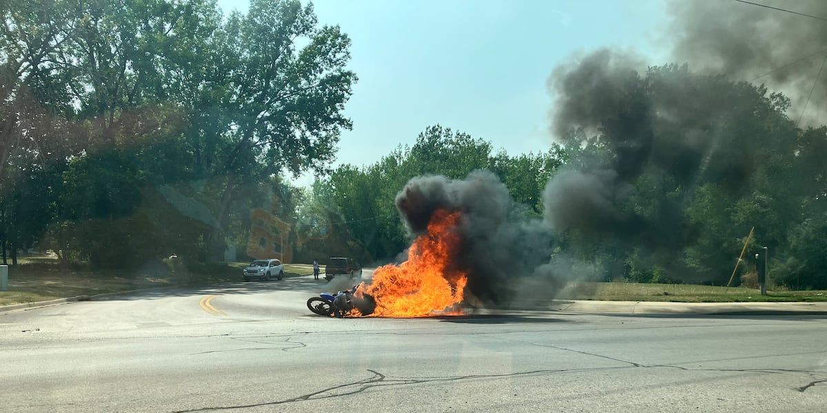 Dirt bike catches fire while being hauled by truck [Video]
